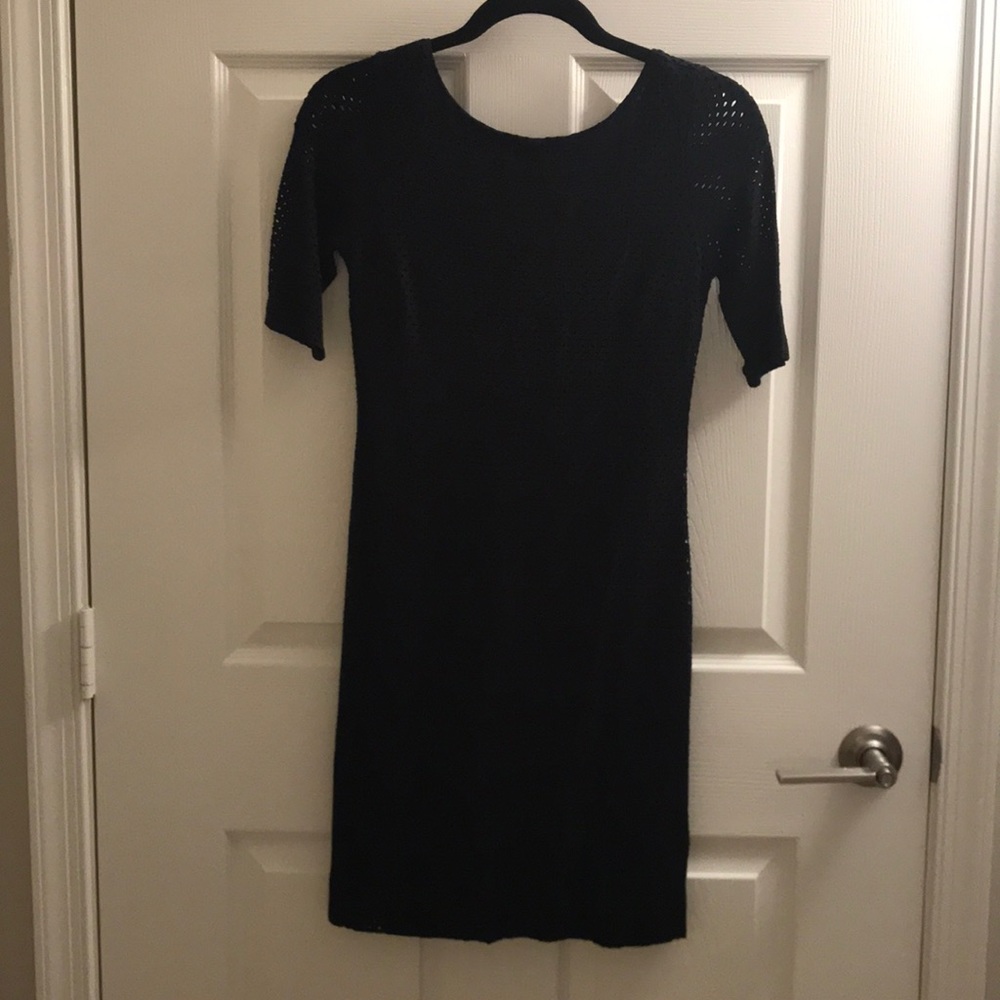 Half sleeve form fitting black dress